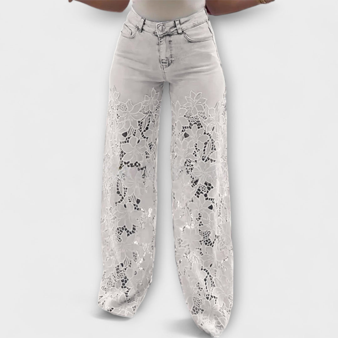 Jeans alla moda in patchwork di pizzo
